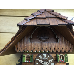Bavarian chalet with beer drinker Schneider